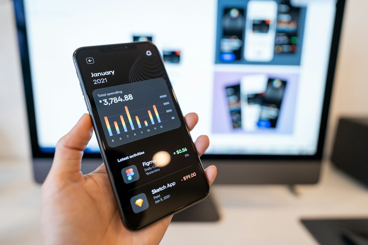 Owner checking a business dashboard app on a smartphone
